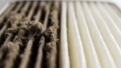 furnace, filter, air, hvac. Close-up of a textured surface showing dusty and clean parallel grooves side by side.