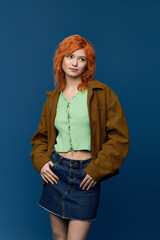 Spring fashion shines with a stylish young woman and vibrant red hair