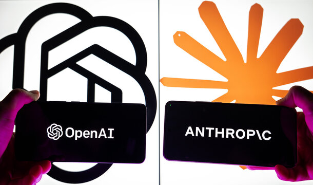 Logos of AI companies OpenAI and Anthropic displayed on smartphone screens, representing the competition in generative artificial intelligence, large language models, and tech industry rivalry.