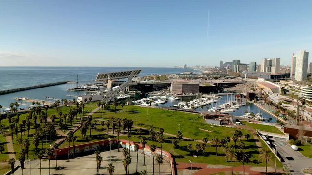 Barcelona, Spain - 27 march 2026: parc del forum aerial view with solar photovoltaic panels and mediterranean sea on a sunny day, modern urban architecture