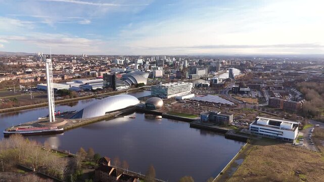 Glasgow Scotland: 13th Feb 2026: Drone view of Glasgow Pacific Quay and dock with the city skyline in the background. Clyde River with buildings and open spaces under a clear sky