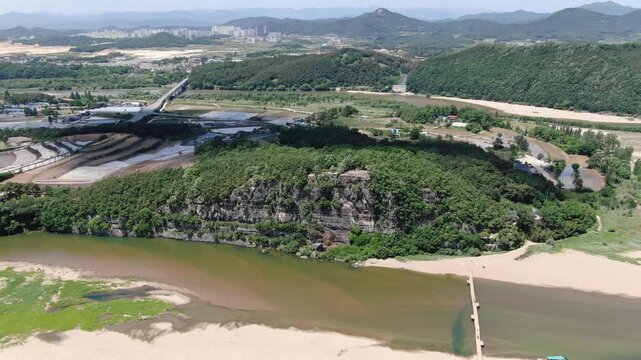 Aerial zoom in on majestic Buyongdae Cliff and Nakdong River, traditional nature landscape in Andong, South Korea