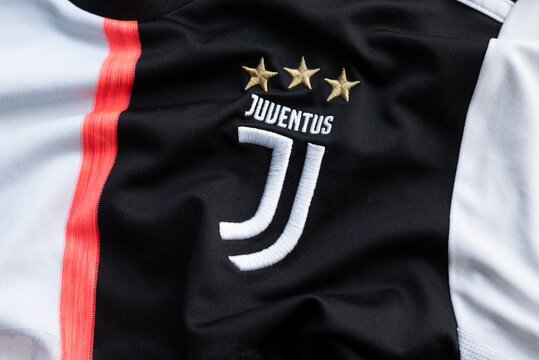 Kyiv, Ukraine. March 27, 2026. Close-up of Juventus FC crest and stars on black, white, and pink soccer jersey.