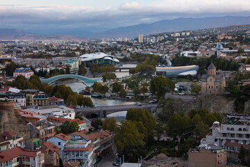 Tbilisi Cityscape Panorama With Metekhi Church And Peace Bridge At Twilight © Vadim Volodin