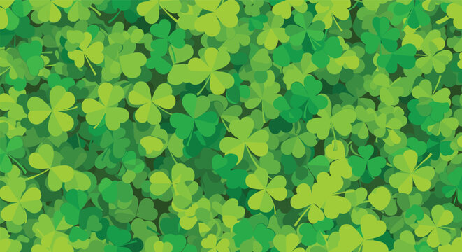 Lush field of vibrant green three leaf clovers and shamrocks creating a dense and luck themed natural background for festive designs.