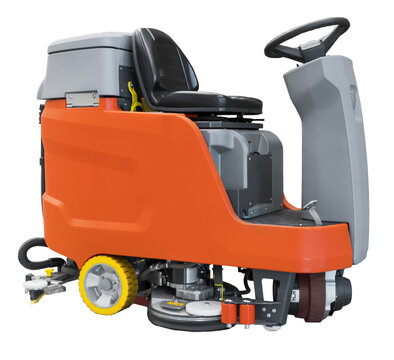Industrial orange and grey ride-on floor scrubber dryer machine isolated on a transparent background.Professional cleaning equipment for large commercial spaces and warehouses. High quality photo