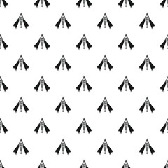 Seamless pattern of indigenous tribal teepee tents with dreamcatcher elements © nsit0108