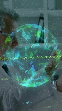 Vertical video: Hologram globe appearing, doctor using pen to rotate it, analyzing medical waveform