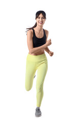 Fototapeta premium Beautiful young happy sporty woman running on white background