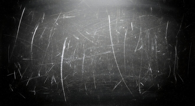 Grungy dark textured background with multiple scratches and scuffs, ideal for grunge or vintage designs.