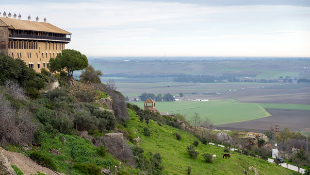 Parador and castle of Carmona, Spain, located on a hill overlooking the valley.