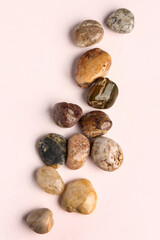 Obraz premium Many pebble stones on white background