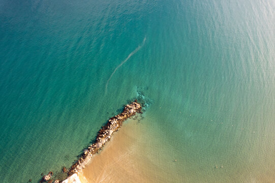 Drone footage of the coastline and sea in Kızkalesi.