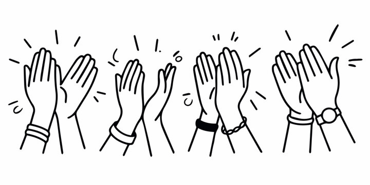 Audience hands clapping at concert stage