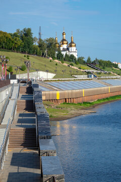 Fragment of the Tyumen embankment with a view on the ancient church