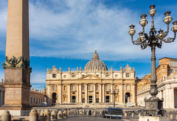 Naklejka premium St Peter's basilica and Egyptian obelisk on St Peter's square in Vatican, Rome, Italy