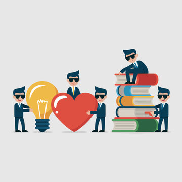 Robots Learning with Books and Light Bulb Heart Symbol