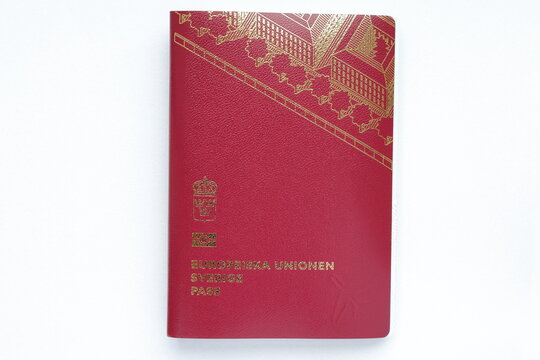 Swedish passport on white background.