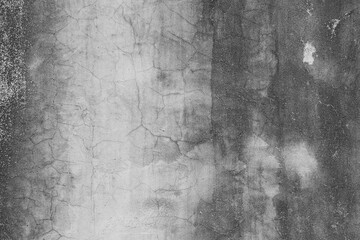 Obraz premium Grunge concrete wall texture with weathered cement stains and cracks. Dramatic distressed background for industrial design, architectural art, and urban vintage backdrop.
