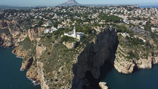 Mediterranean coastal landscape with Cabo de la Nau lighthouse, Spain