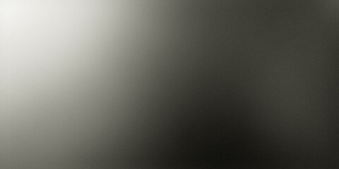 Naklejka premium A close-up view of a textured gray surface illuminated by a bright light source