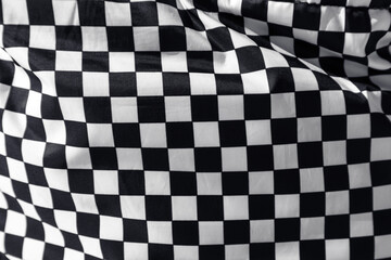 Obraz premium Checkered flag. Finish flag. Fabric with a texture of black and white squares