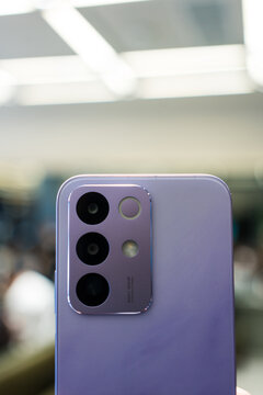 Bangkok, Thailand - March 27, 2026 : Realme phone Parrot Purple Colors. Rear Camera Sony IMX852 50MP