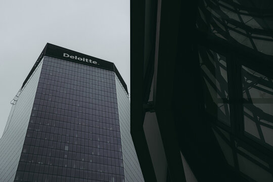 Warsaw, Poland - February 22, 2026: Exterior view of the Deloitte office building in the business district.