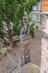 Fototapeta premium Statue of Bruncvík and his Faithful Lion on Charles Bridge in the Prague old city in Czech Republic