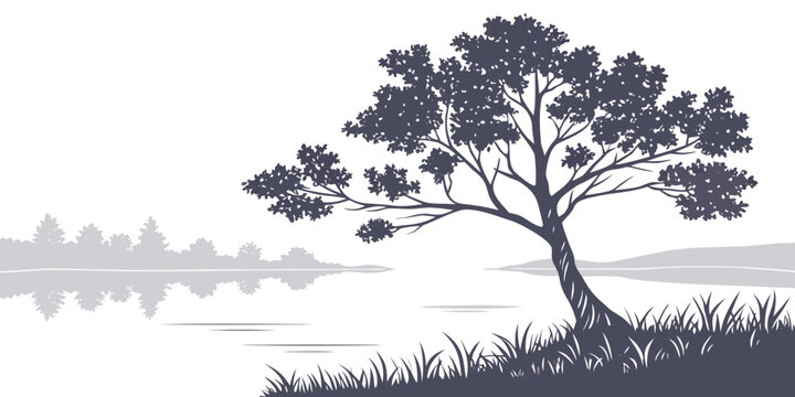 A solitary tree stands tall on a hill overlooking a serene lake at sunset.