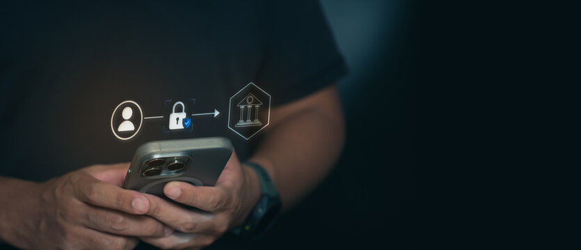 Cyber security concept showing secure mobile payment and digital banking system with glowing lock icon over smartphone representing financial data protection and fintech technology.