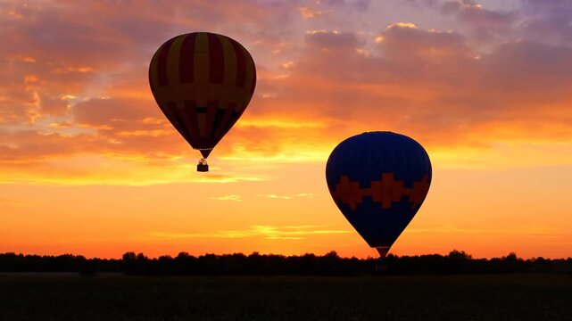 Hot air balloons at sunset.
