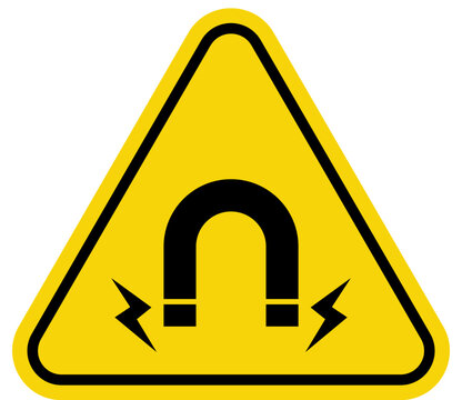 Yellow warning triangle with horseshoe magnet symbol indicating magnetic field danger isolated on white background