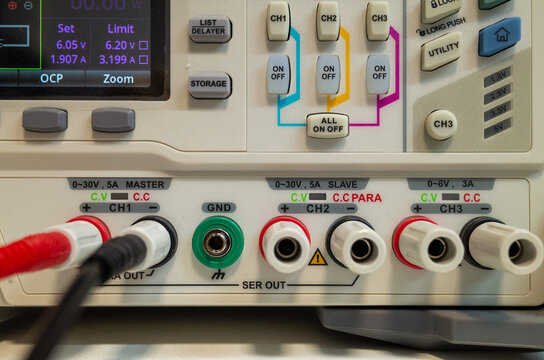 Close-up of electronic power supply controls and connections