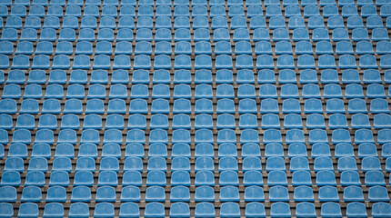 Fototapeta premium empty blue stadium seats, football, sports venue