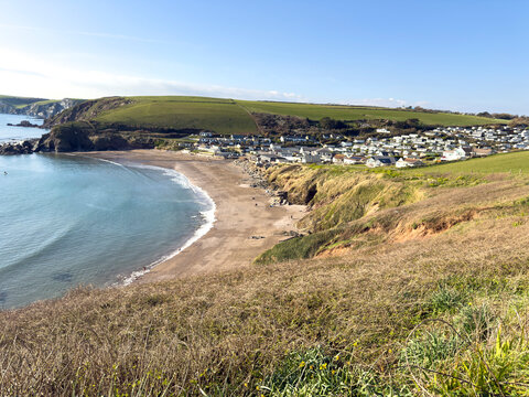 South Devon UK. 21.03.2026. A scenic view of a residential area with static homes at Callaborough in South Devon and situated on a terraced hillside, suggesting a coastal community.