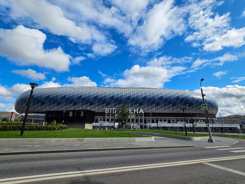 MOSCOW - AUG 25, 2025: Stadium with a large sign that says VTB arena. The sky is cloudy and the sun is shining