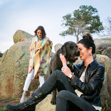 Woman Bonding with Large Dog Outdoors Showing Friendship and Companionship