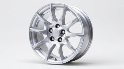 Obraz premium Silver multi spoke alloy wheel shown in close up on a white background in a well lit studio setting for product display
