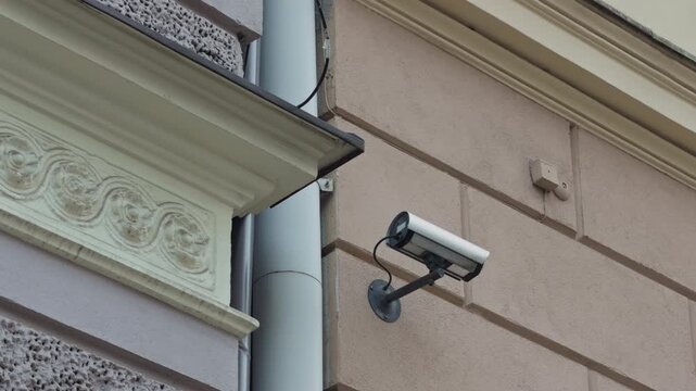 Municipal building features surveillance cameras for safety and regulatory compliance
