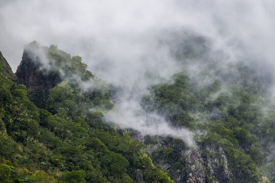 Scenic cloudy landscape of Cirque de Salazie, La Reunion island, French oversea department, Indian Ocean	