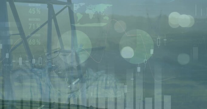 Animation of graphs and financial data over electricity pole at sunset