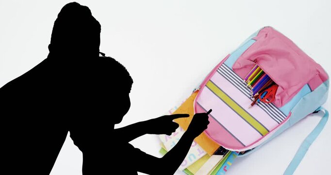Animation of two children in silhouette over schoolbag and books on white background