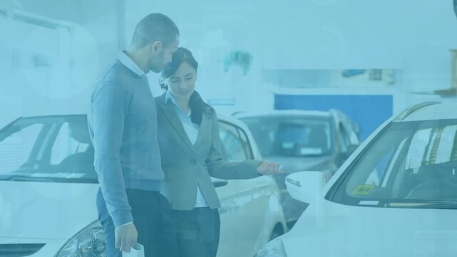 Animation of data processing over caucasian man with businesswoman in car salon
