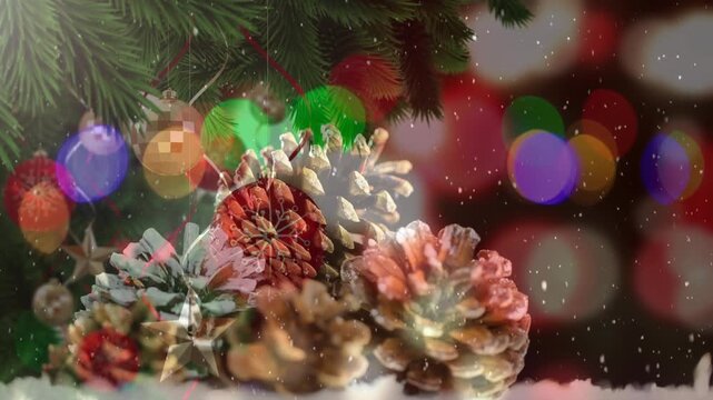 Animated seamless Christmas scene with snow and pine cone decor.