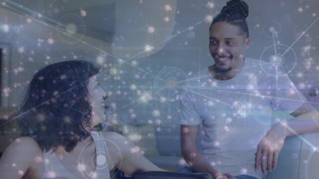 Animation of connections over happy diverse couple talking