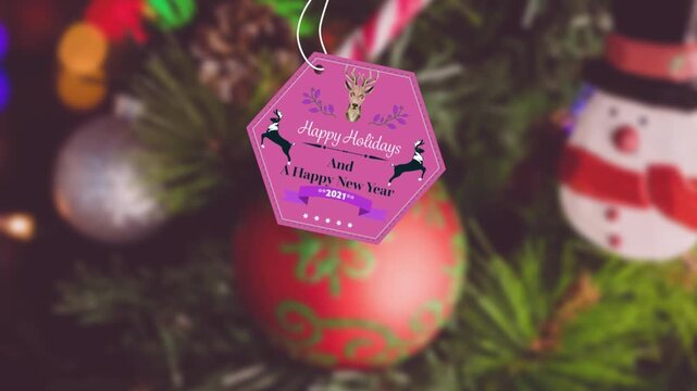 Animation of happy christmas and happy new year text banner hanging against decorated christmas tree