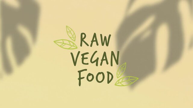 Animation of raw vegan food text over leaves shadow and yellow background