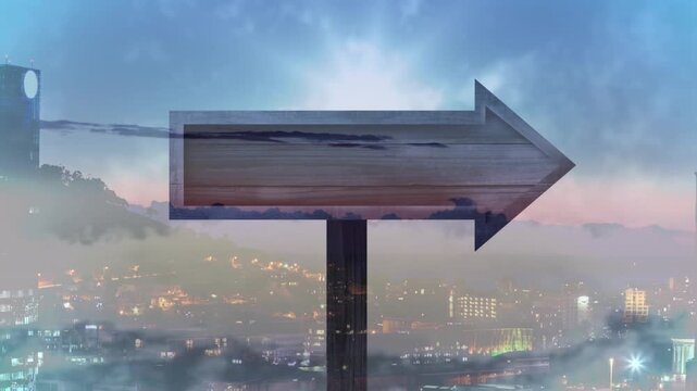 Animation of clouds over arrow and cityscape at evening