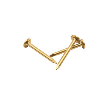 Three polished brass construction nails arranged in a triangular formation on a transparent background, industrial hardware craftsmanship concept